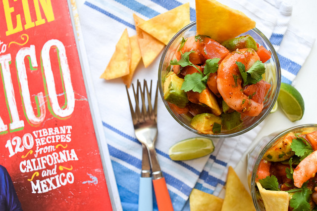 This easy, Mexican twist on a classic prawn cocktail made with avocado, lime and a spicy tomato V8 juice sauce makes a great dinner party starter before a Mexican spread.