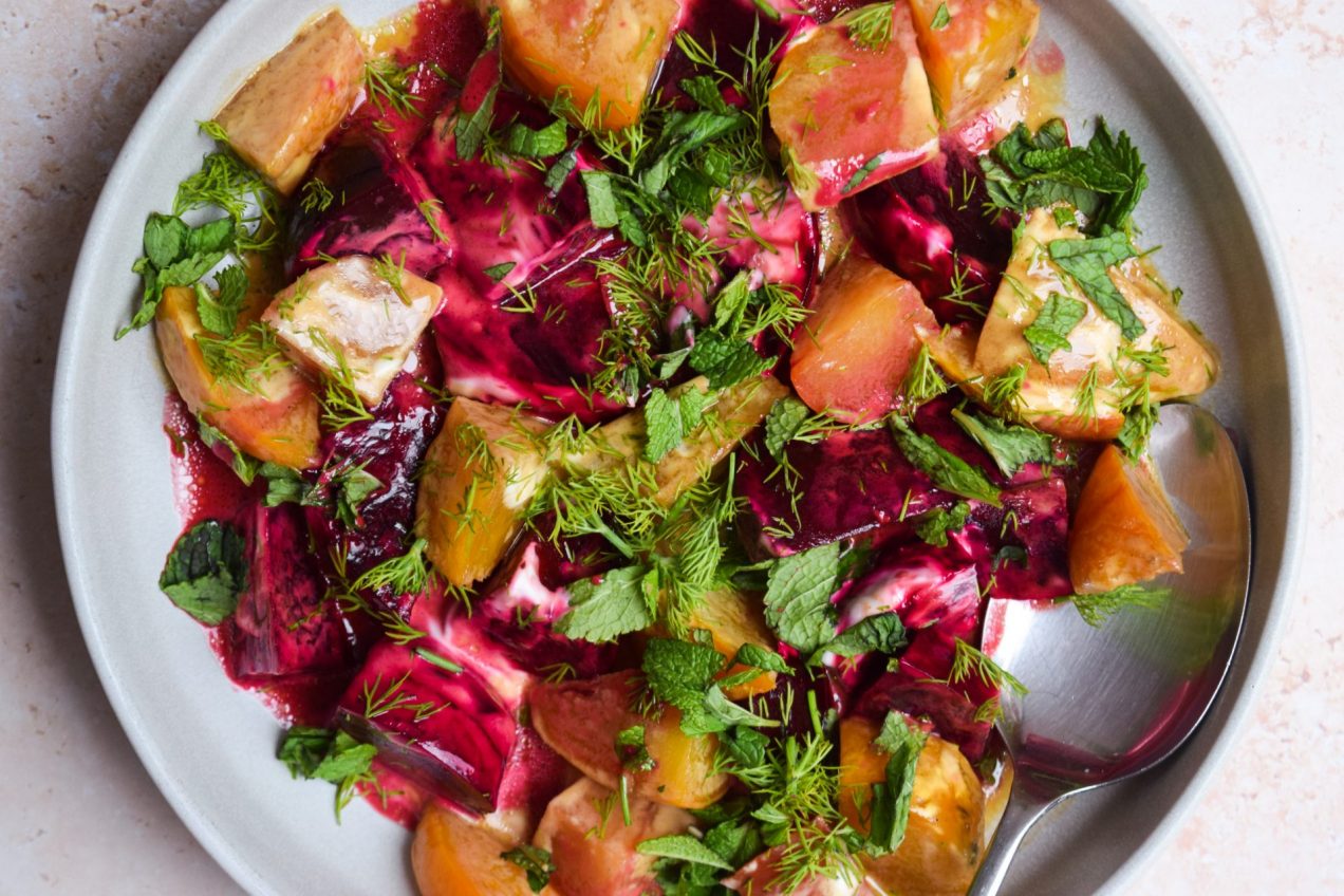 Close up of a Greek beet salad made with yellow and purple beetroot.