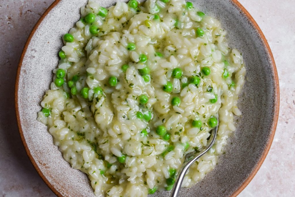 Close up of a bowl of wild garlic butter risotto.