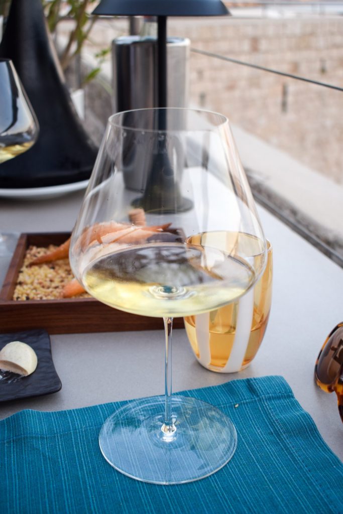 Glass of white wine on the table at 360 Dubrovnik.