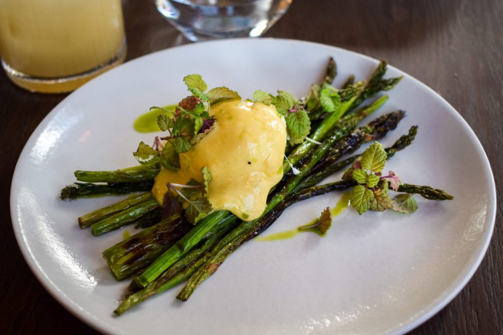 Charred asparagus topped with hollandaise and a poached egg.
