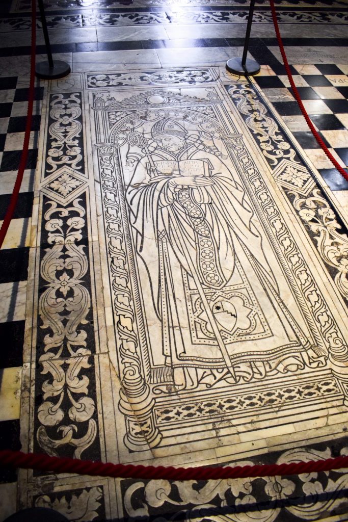 Tomb-style mosaic on the floor of Siena cathdral.