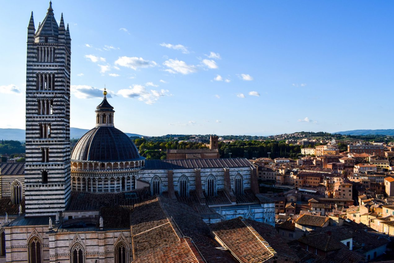 View of the dome of Siena Duomo at golden hour.