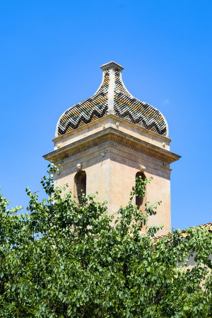 Close up of a tiled building dome.