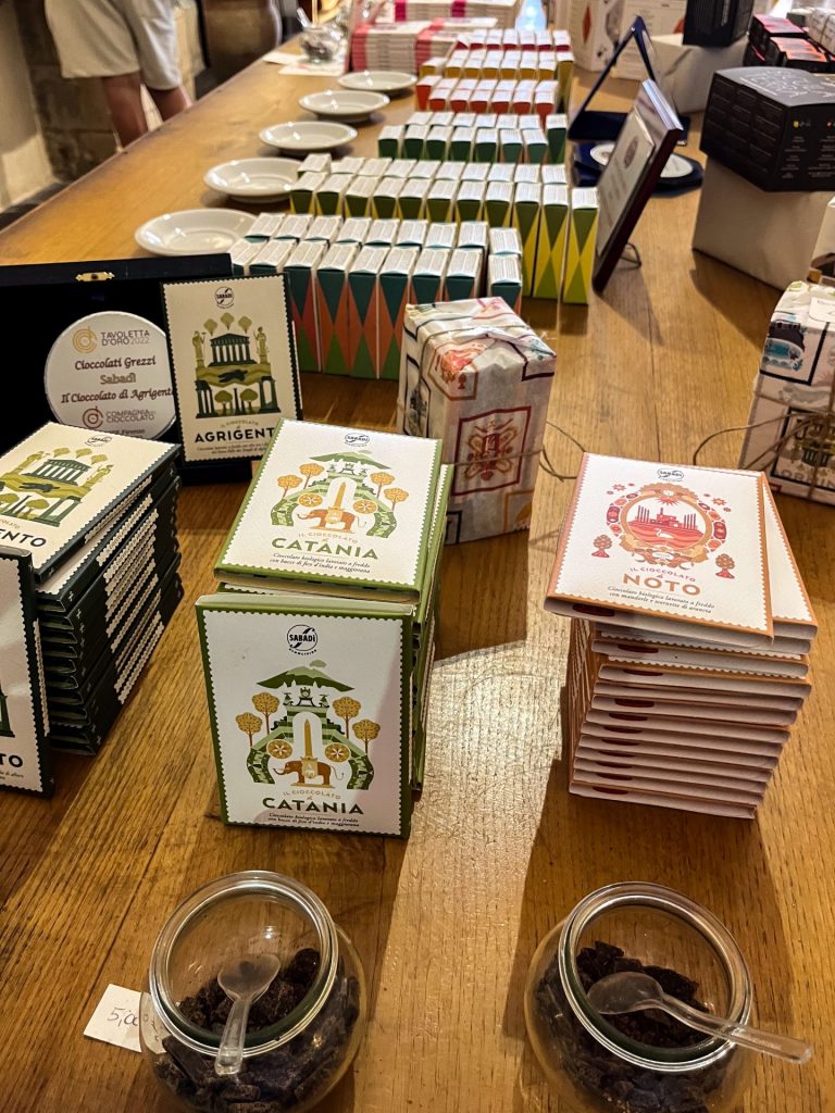 Chocolate bars on a shop display table.