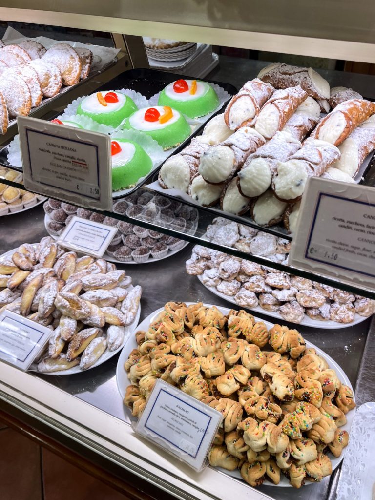 Traditional Sicilian pastries in a pastry case display