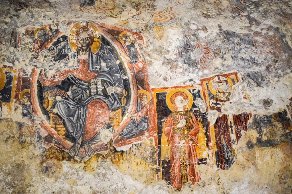 Close up of faded church frescos.