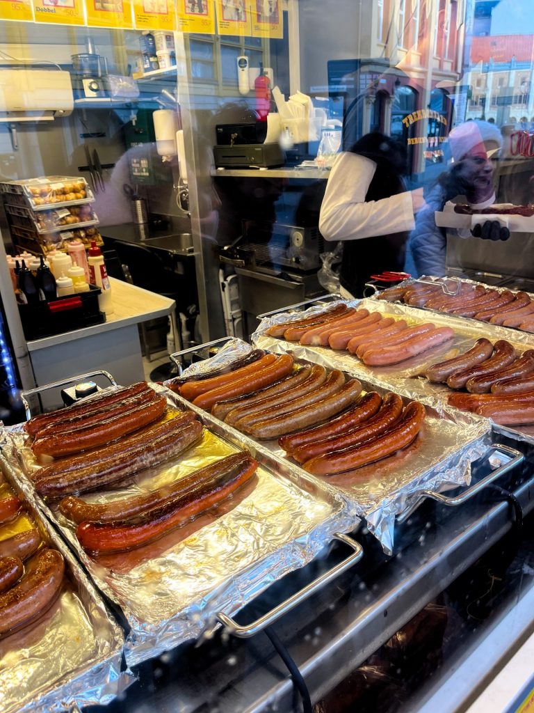 Hot dogs cooking in the window of the stand on Kong Oscars Gate, Bergen