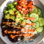 Korean beef mince rice bowl with kimchi, avocado, cucumber and a gochujang drizzle.