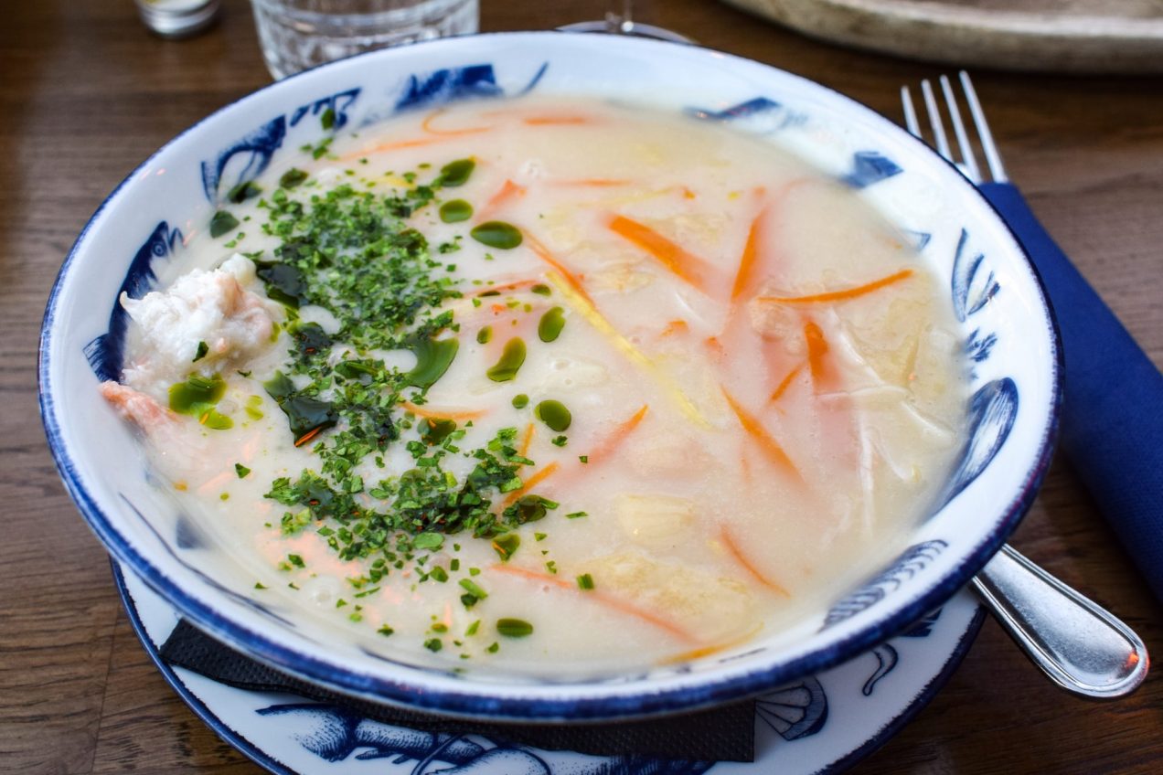 Blue and white patterned bowl of Norwegian Fish Soup.