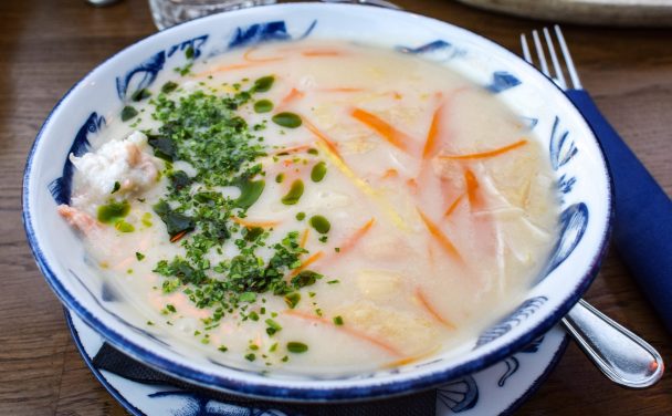 Blue and white patterned bowl of Norwegian Fish Soup.