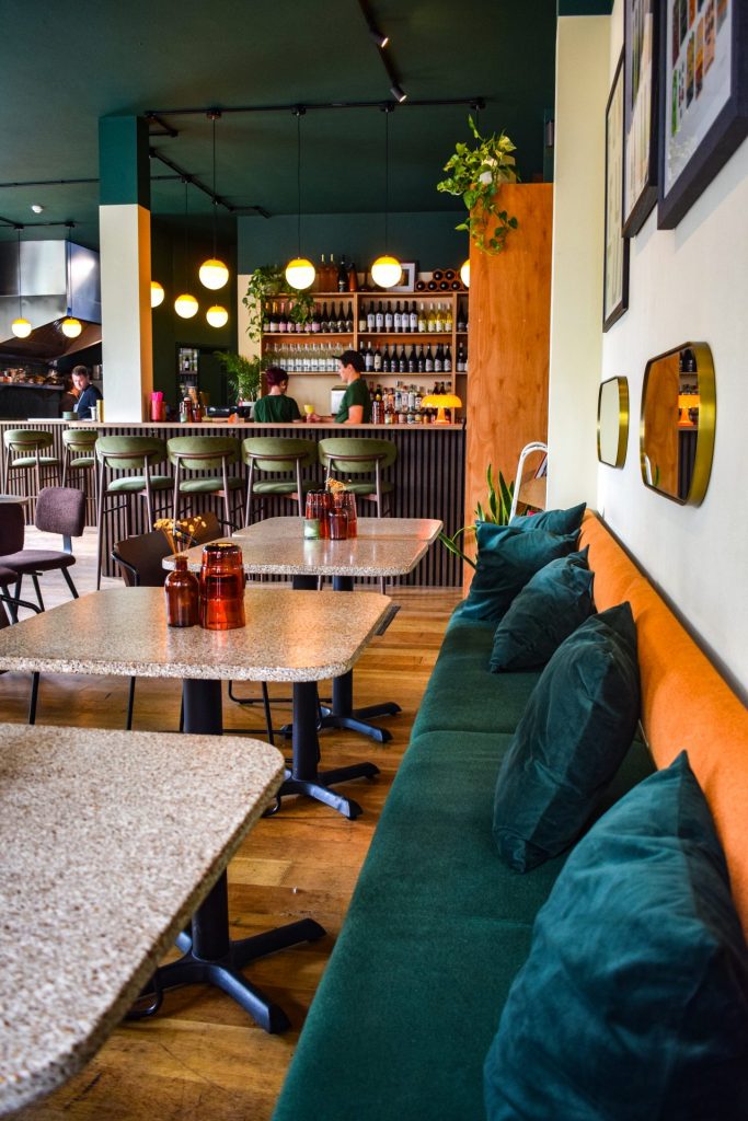 Dining room showing the bench seating and bar at Pomus, Folkestone.